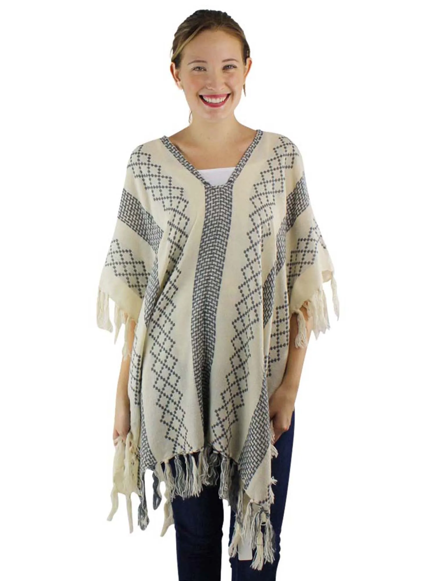 Mixed Pattern Knit Poncho With Tassel Fringe