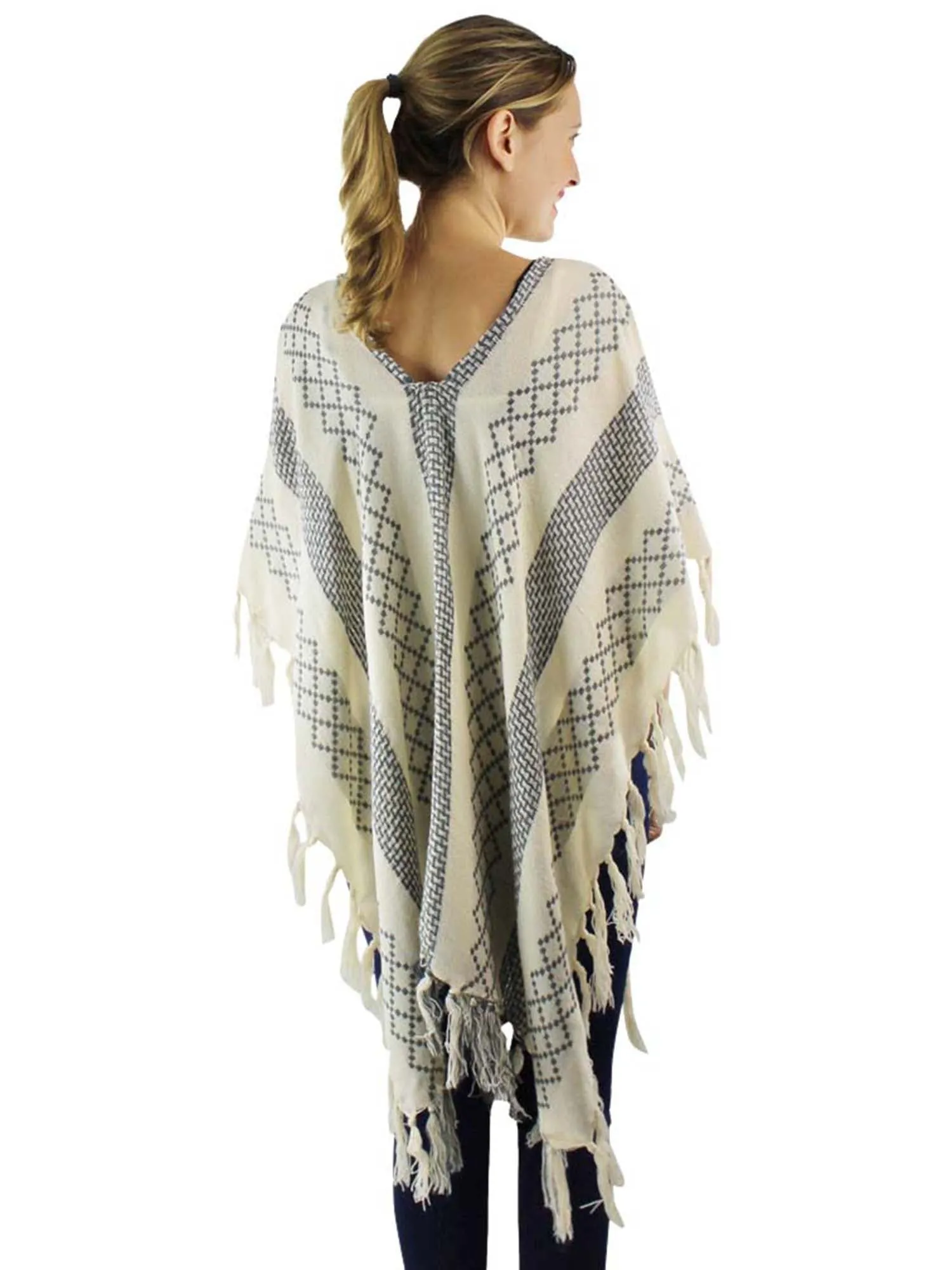 Mixed Pattern Knit Poncho With Tassel Fringe