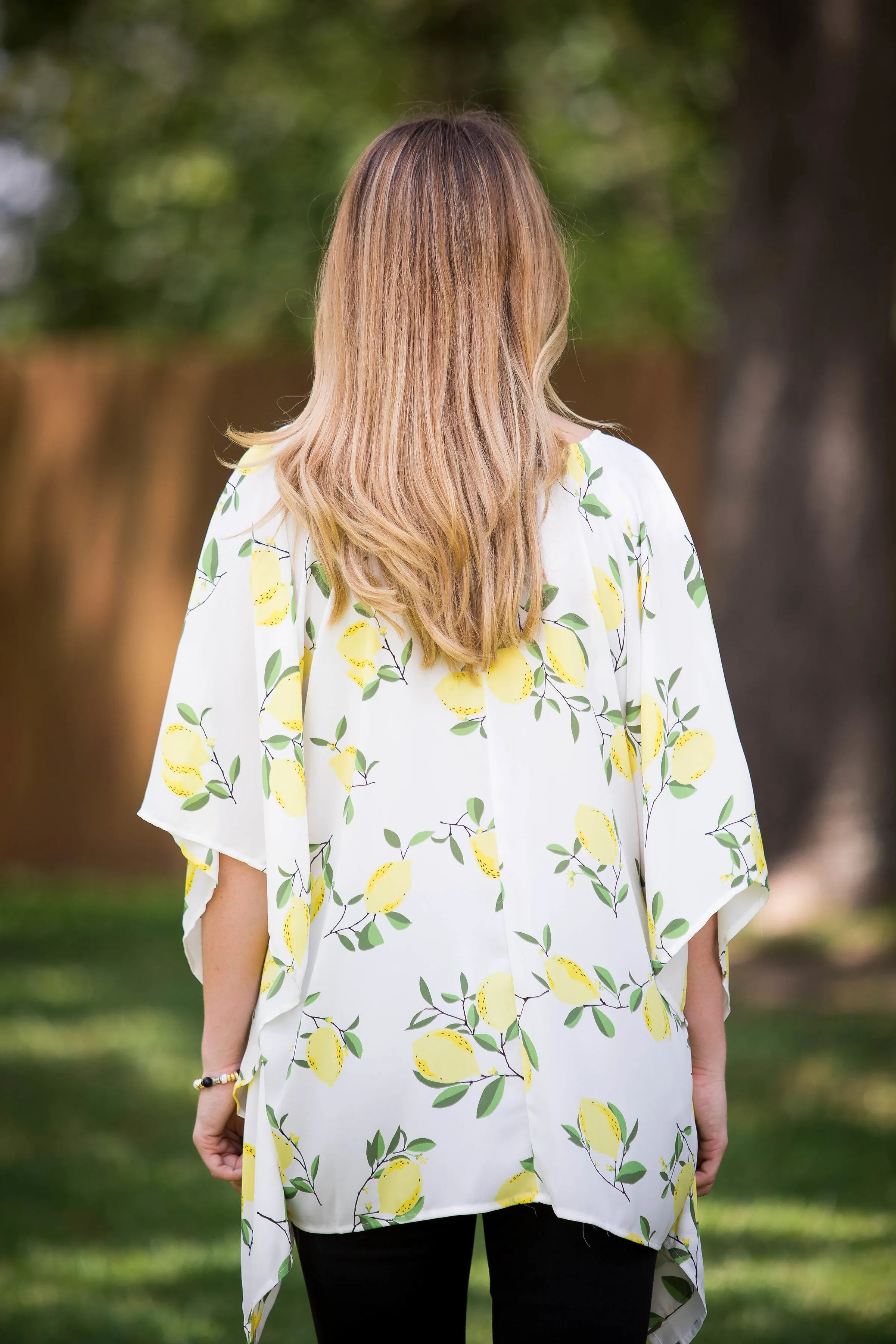 This Is Happiness Lemon Print Oversized Poncho Top with Lace Up Detail